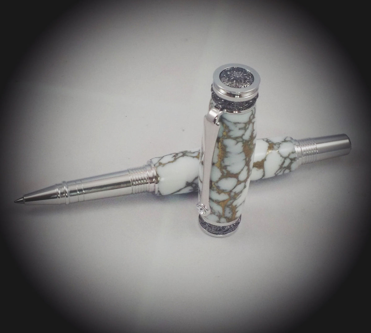 Rhodium Majestic Jr. Rollerball Pen wearing white/gold matrix Tru-Stone